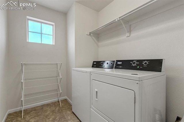 6775 Hazel Branch Ct, Colorado Springs, CO 80927 - washroom featuring washer and clothes dryer, baseboards, and laundry area