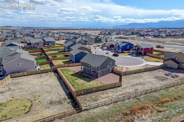aerial view with a residential view and a mountain view