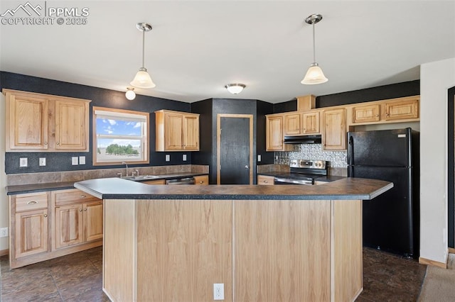 kitchen with a sink, appliances with stainless steel finishes, dark countertops, under cabinet range hood, and light brown cabinetry