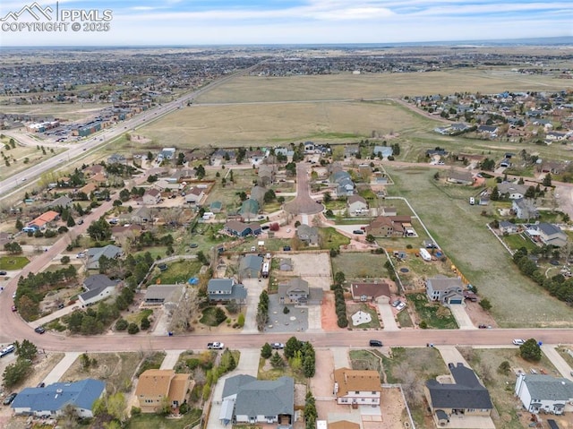 view of property location featuring nearby suburban area