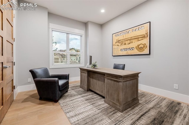 office with light wood-style floors, recessed lighting, and baseboards