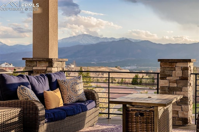 balcony featuring a mountain view