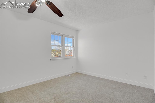3925 Zurich Dr, Colorado Springs, CO 80920 - spare room featuring ceiling fan, carpet floors, a textured ceiling, and baseboards