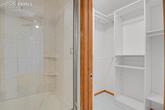 3925 Zurich Dr, Colorado Springs, CO 80920 - full bathroom featuring a shower with door and tile patterned floors