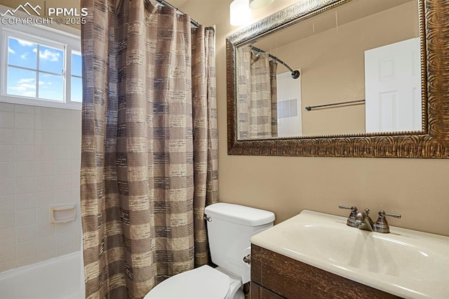 3925 Zurich Dr, Colorado Springs, CO 80920 - full bath featuring toilet, vanity, and shower / tub combo with curtain