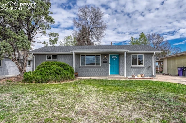 5477 E Asbury Ave, Denver, CO 80222 - single story home with a front lawn and brick siding