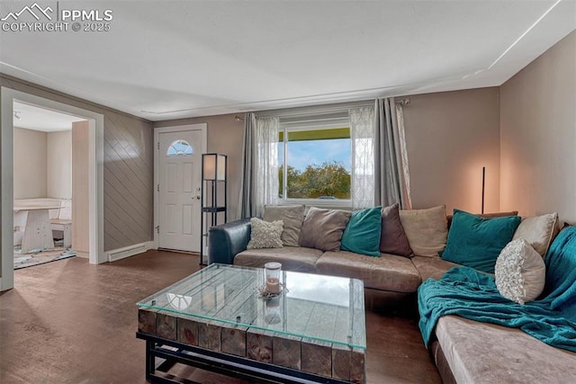5477 E Asbury Ave, Denver, CO 80222 - living area featuring baseboards