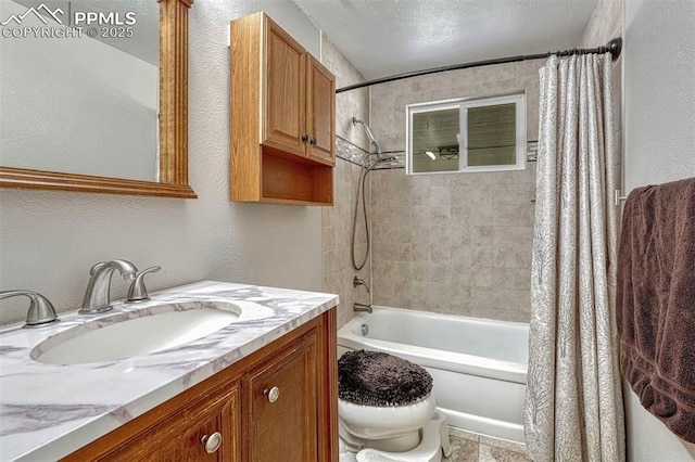 5477 E Asbury Ave, Denver, CO 80222 - full bath with shower / bathtub combination with curtain, a textured wall, vanity, and toilet