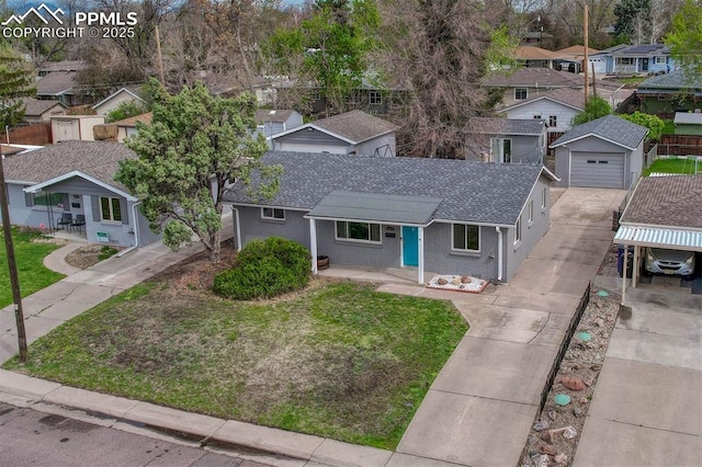 5477 E Asbury Ave, Denver, CO 80222 - view of front of house with roof with shingles, a residential view, driveway, a garage, and a front yard