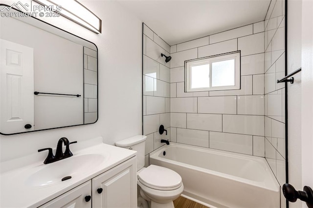 2222 Frontier Dr, Colorado Springs, CO 80911 - bathroom with vanity, toilet, and shower / washtub combination
