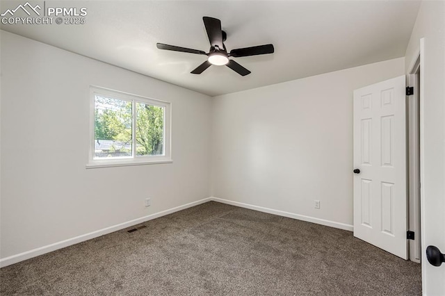 2222 Frontier Dr, Colorado Springs, CO 80911 - empty room with visible vents, baseboards, dark carpet, and ceiling fan