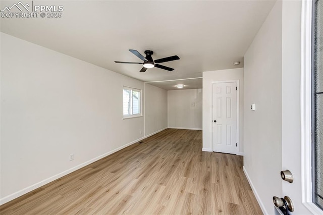 2222 Frontier Dr, Colorado Springs, CO 80911 - empty room featuring light wood-style floors, a ceiling fan, and baseboards