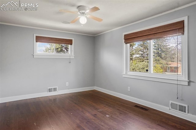 unfurnished room featuring visible vents and baseboards