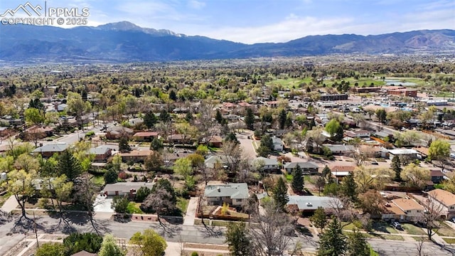 drone / aerial view with a mountain view and a residential view