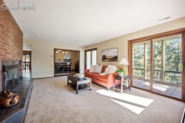 13435 Darr Dr, Colorado Springs, CO 80908 - carpeted living room with a brick fireplace