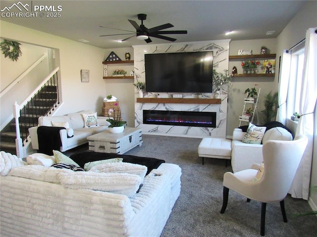 8766 Beaverhead Cir, Colorado Springs, CO 80908 - living area featuring carpet, ceiling fan, a premium fireplace, and stairway