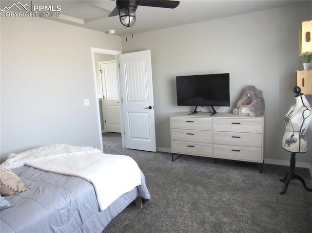 8766 Beaverhead Cir, Colorado Springs, CO 80908 - bedroom with dark carpet, a ceiling fan, and baseboards