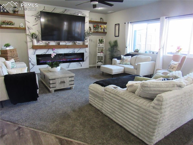 8766 Beaverhead Cir, Colorado Springs, CO 80908 - living room featuring carpet flooring, a high end fireplace, and ceiling fan