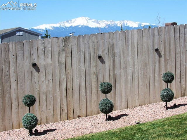8766 Beaverhead Cir, Colorado Springs, CO 80908 - exterior view of fence and a mountain view