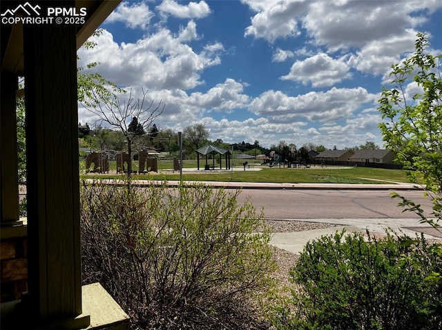 2790 Winterbourne St, Colorado Springs, CO 80910 - view of asphalt road with sidewalks and curbs