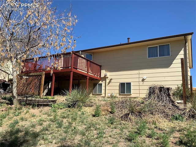 6905 Chippewa Rd, Colorado Springs, CO 80915 - rear view of house featuring a deck