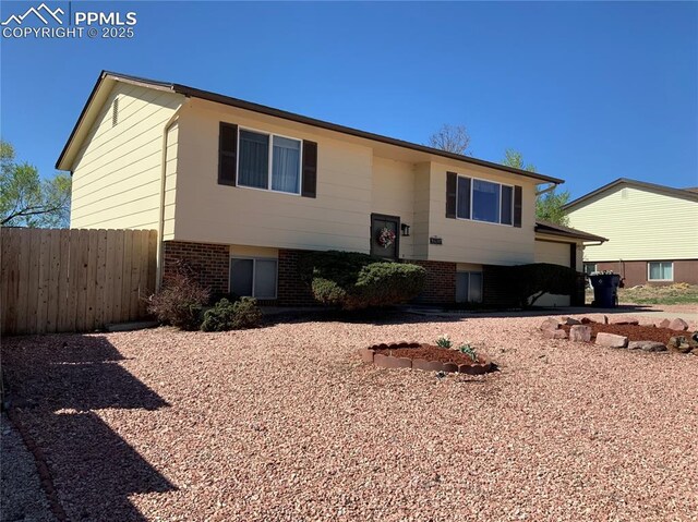 6905 Chippewa Rd, Colorado Springs, CO 80915 - view of front of property with brick siding