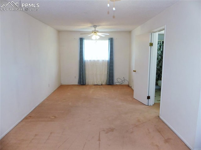 6905 Chippewa Rd, Colorado Springs, CO 80915 - empty room featuring light carpet and a ceiling fan