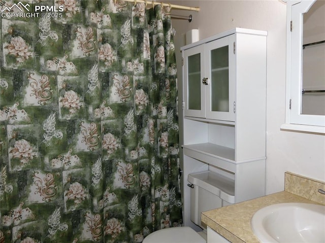 6905 Chippewa Rd, Colorado Springs, CO 80915 - bathroom with vanity and toilet