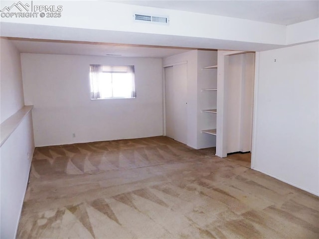6905 Chippewa Rd, Colorado Springs, CO 80915 - unfurnished bedroom featuring carpet floors and two closets