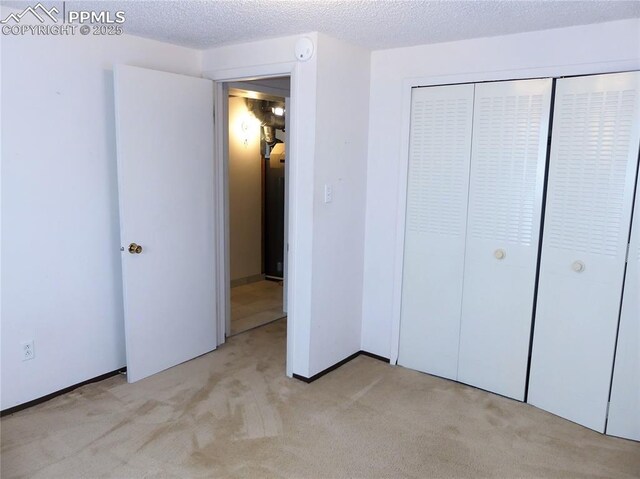 6905 Chippewa Rd, Colorado Springs, CO 80915 - unfurnished bedroom featuring light carpet and a closet