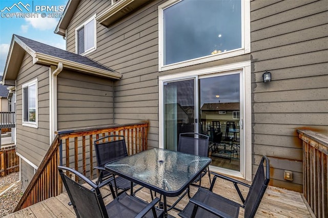 deck featuring outdoor dining area