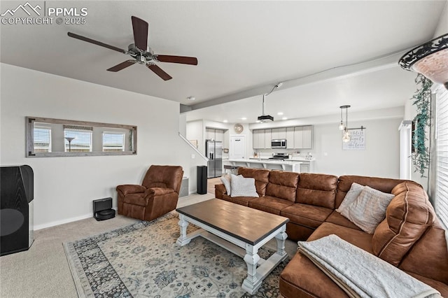 carpeted living room with recessed lighting, ceiling fan, and baseboards