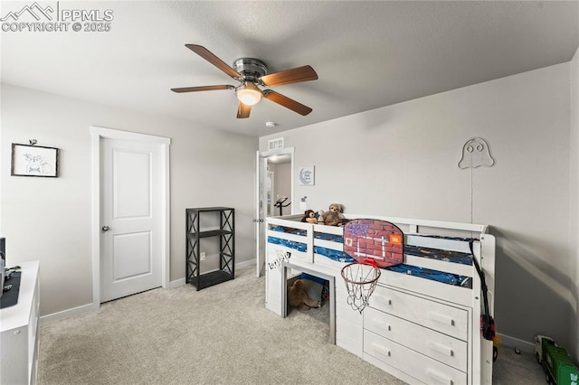 bedroom featuring baseboards, carpet, ceiling fan, and visible vents