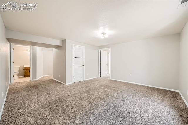 4337 Levi Ln, Colorado Springs, CO 80925 - unfurnished bedroom featuring carpet flooring, baseboards, and ensuite bathroom