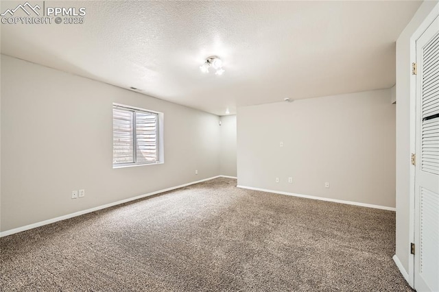 4337 Levi Ln, Colorado Springs, CO 80925 - spare room featuring carpet floors, baseboards, and a textured ceiling