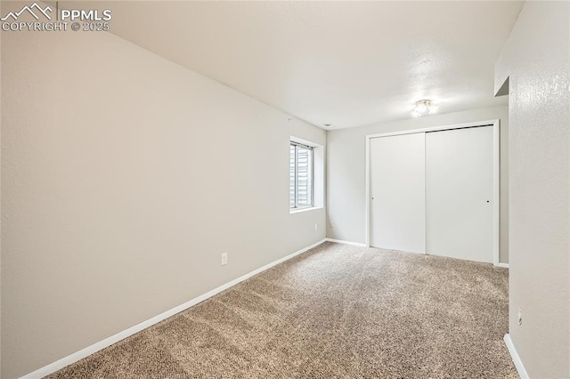 4337 Levi Ln, Colorado Springs, CO 80925 - unfurnished bedroom with carpet floors, baseboards, and a closet