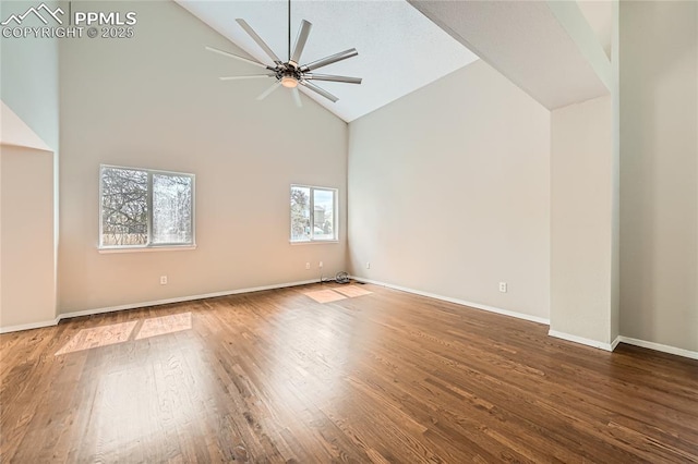 4337 Levi Ln, Colorado Springs, CO 80925 - empty room featuring baseboards, ceiling fan, wood finished floors, and high vaulted ceiling
