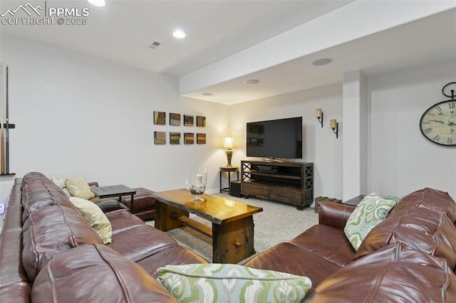 living room with recessed lighting, carpet floors, and visible vents