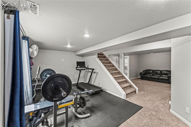 workout room with baseboards, carpet flooring, a textured ceiling, and recessed lighting