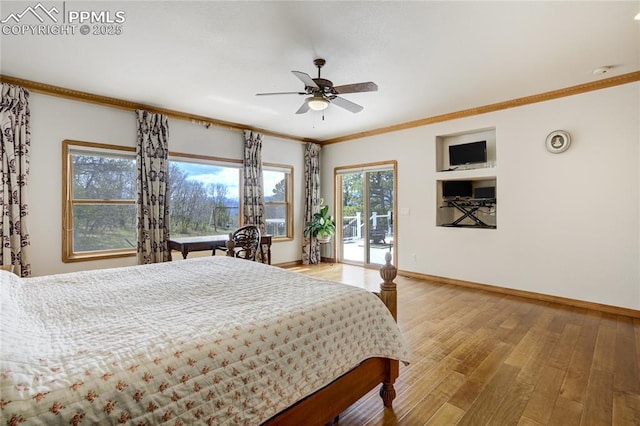 bedroom featuring access to outside, wood finished floors, baseboards, crown molding, and ceiling fan