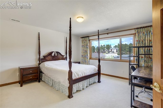 bedroom featuring carpet flooring and baseboards