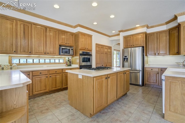 kitchen featuring stainless steel appliances, a center island, recessed lighting, light tile patterned flooring, and crown molding