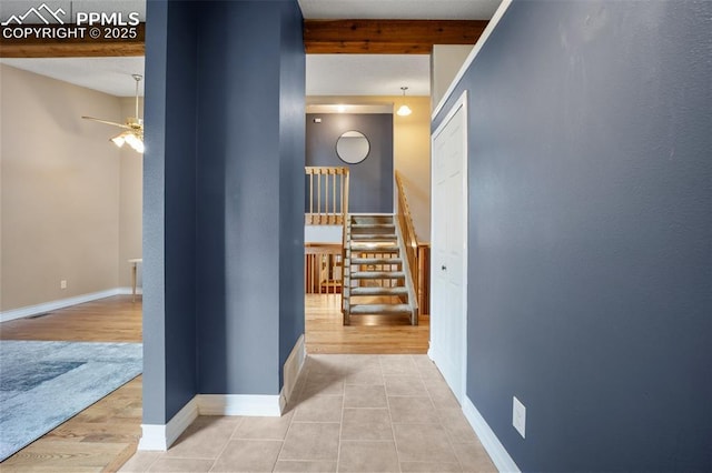 6277 Gunshot Pass Dr, Colorado Springs, CO 80917 - hallway with stairway, baseboards, and tile patterned flooring