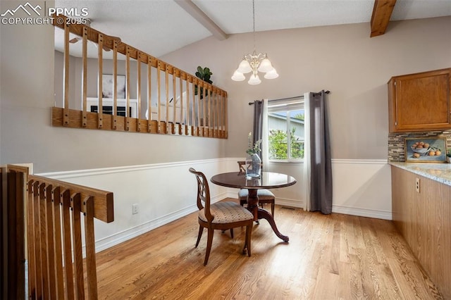 6277 Gunshot Pass Dr, Colorado Springs, CO 80917 - dining space with light wood finished floors, a chandelier, and baseboards
