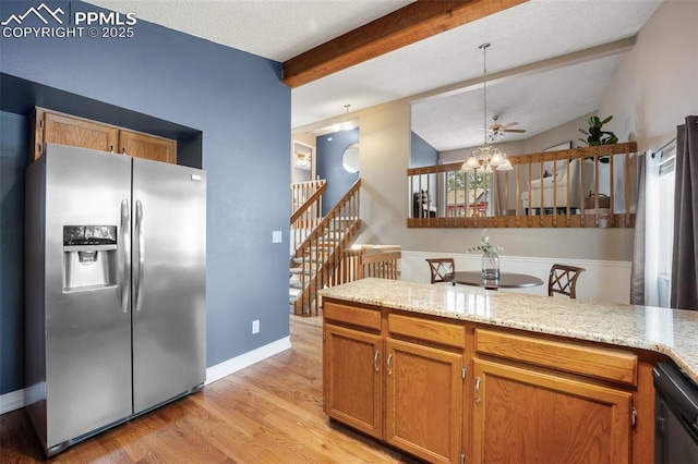 6277 Gunshot Pass Dr, Colorado Springs, CO 80917 - kitchen with stainless steel refrigerator with ice dispenser, light wood-style floors, a chandelier, dishwasher, and hanging light fixtures