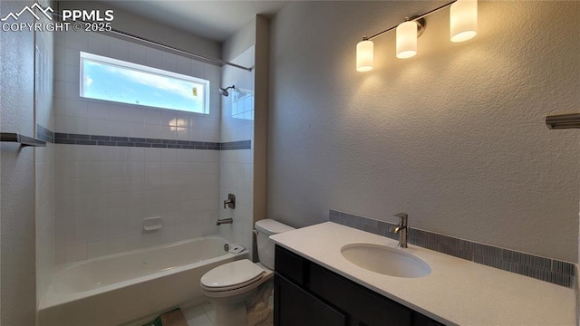 10630 Wolf Lake Dr, Colorado Springs, CO 80924 - bathroom featuring toilet, a textured wall, bathtub / shower combination, and vanity