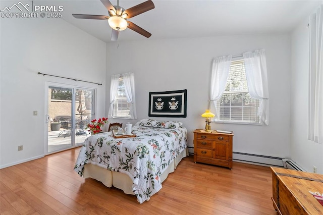 7815 Antigua Pt, Colorado Springs, CO 80920 - bedroom with access to outside, multiple windows, lofted ceiling, and light wood-type flooring