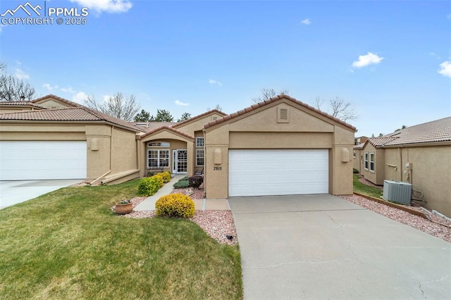 ranch-style home with driveway, a front yard, central AC, an attached garage, and stucco siding