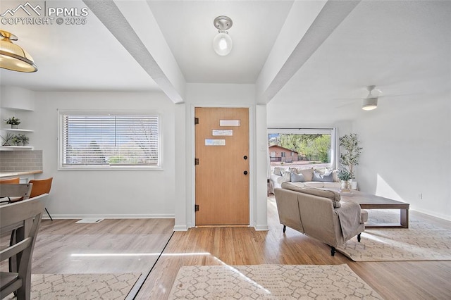 137 N 14th St, Colorado Springs, CO 80904 - entryway with baseboards and wood finished floors