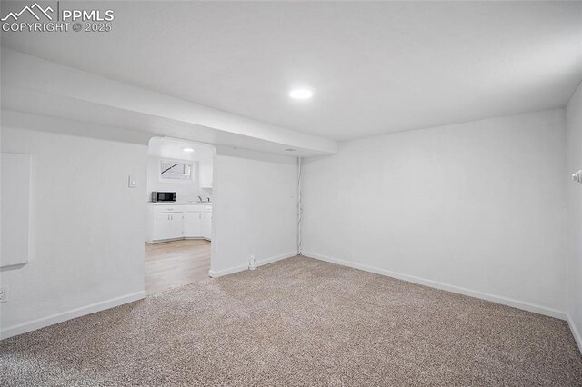 137 N 14th St, Colorado Springs, CO 80904 - finished basement featuring baseboards, recessed lighting, and light carpet